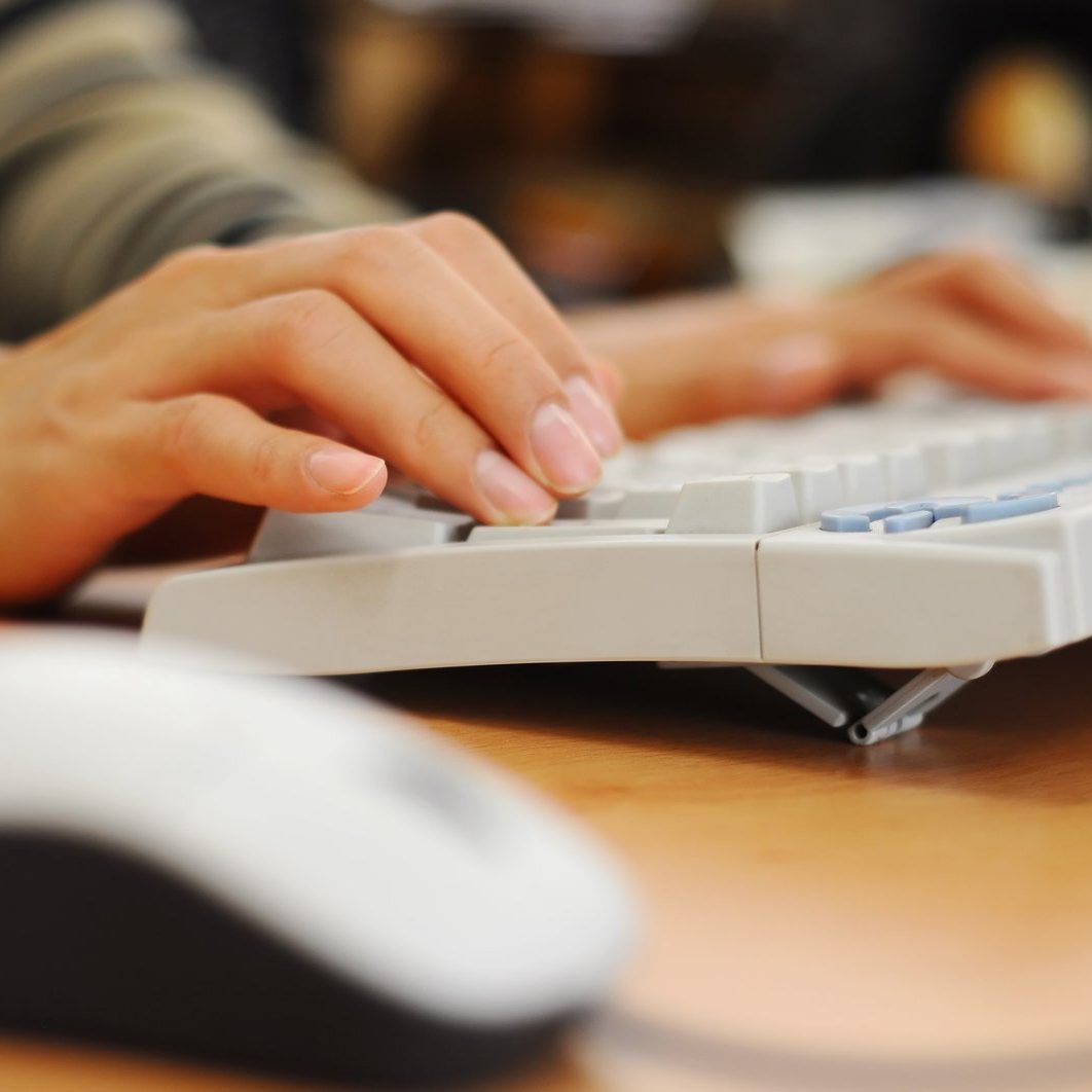 woman-using-computer-1241717